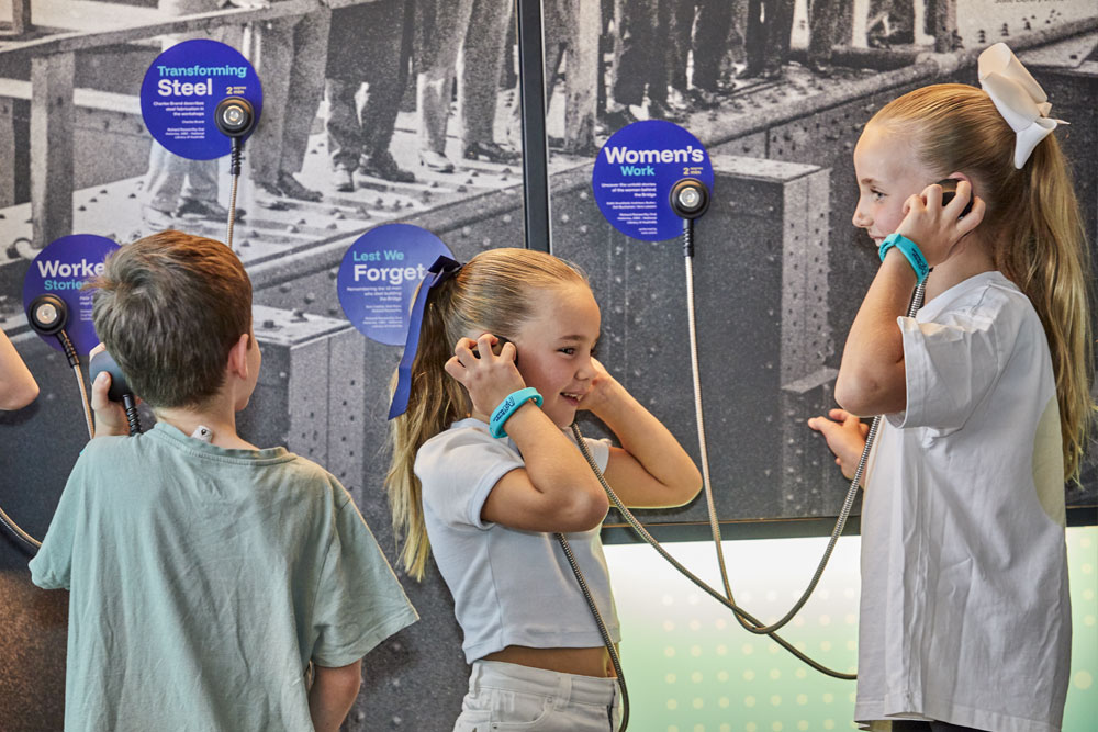 Kids at the BridgeMuseum listening to Bridge history