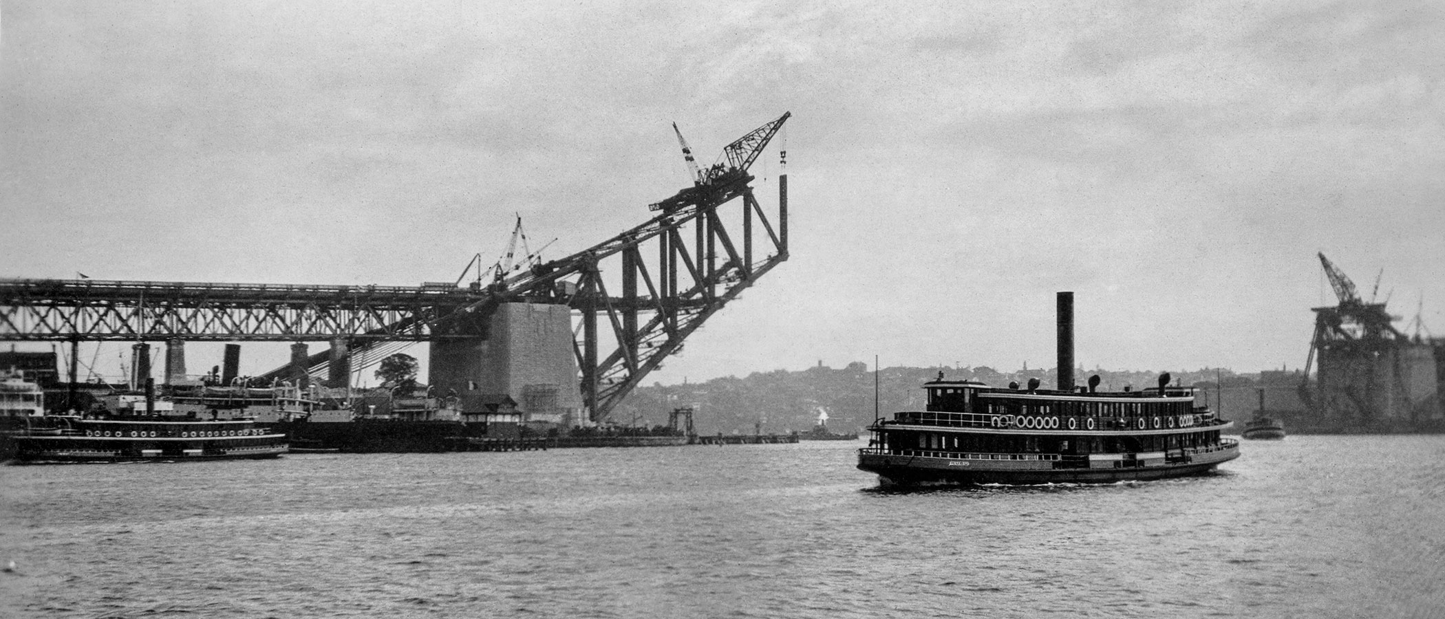 Start of contruction of Sydney Harbour Bridge