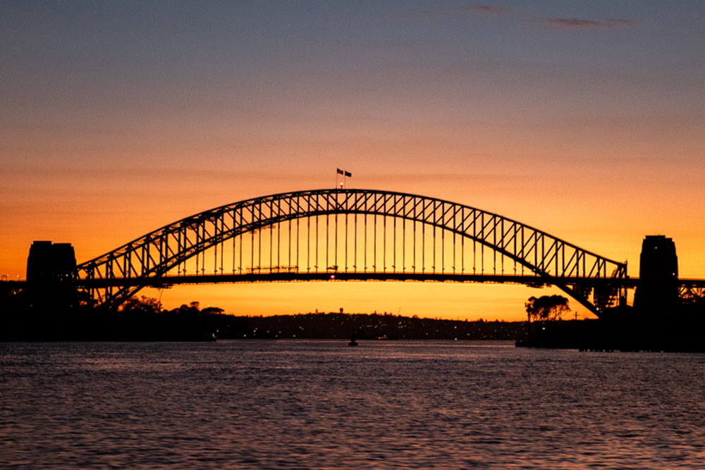 Sunset behind Sydney Harbour Bridge